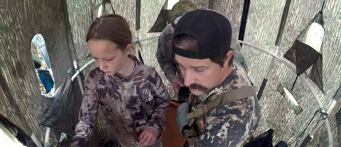 Clara and her father Kurtis are pictured hunting for turkeys in this screenshot from the third installment of an Idaho Fish & Game video series, "Maiden Hunt", which explores new hunters and their mentors as they learn about hunting.