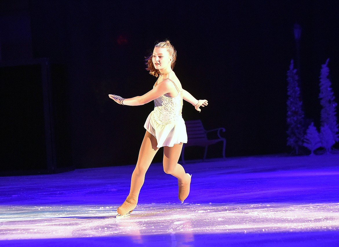 Sophia Burrough skates during the Glacier Skate Academy’s Christmas on Ice show at the Stumptown Ice Den. (Heidi Desch/Whitefish Pilot)