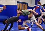 Wrestling team looks solid, will be home way more than usual