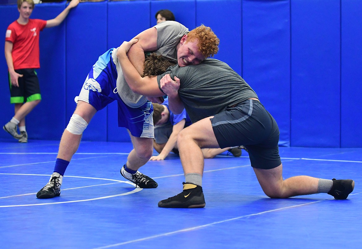 Jordan Knapton (left) and Rowdy White (right) grapple during the first practice of the season. (Teresa Byrd/Hungry Horse News)