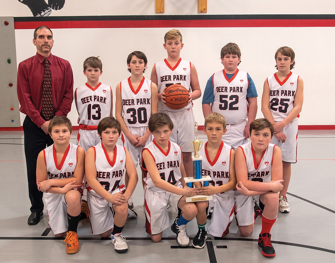 The Deer Park fifth and sixth grade basketball team recently won the county small school championship under the guidance of coach Robert Hall. Front row, from left is Jaxson Caldwell, Hunter Strandberg, Hayden Strandberg, Hunter Perry; back row coach Hall, Willem Pedersen, Jory Hill, Rhett Linskoog, Blayze McCracken and Tyson Bessen. Not pictured is Eli Crockett and Eddie Read. The boys beat Homeschool 50-13 and had a 14-0 record.