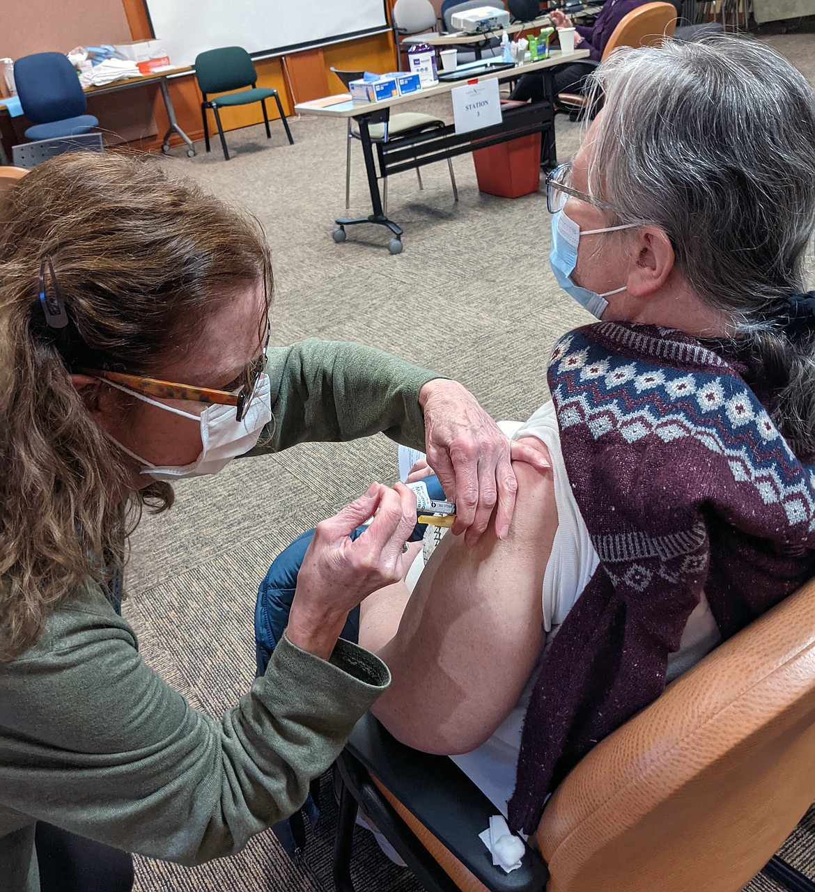 North Valley Hospital Patient Screener Nurse Kathy Thomas was one of the first staff members at the hospital to receive the COVID-19 vaccine. (Photo courtesy North Valley Hospital)