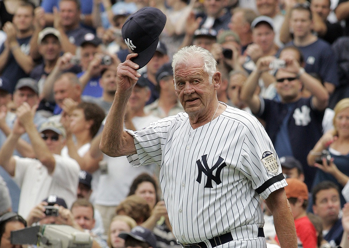 ED BETZ/Associated Press
Former New York Yankees picher Don Larsen tips his hat to fans during introduction ceremonies before an old-timers game at Yankee Stadium in New York in 2008. Larsen, who lived in Hayden Lake following retirement, died Jan. 1. He was 90.