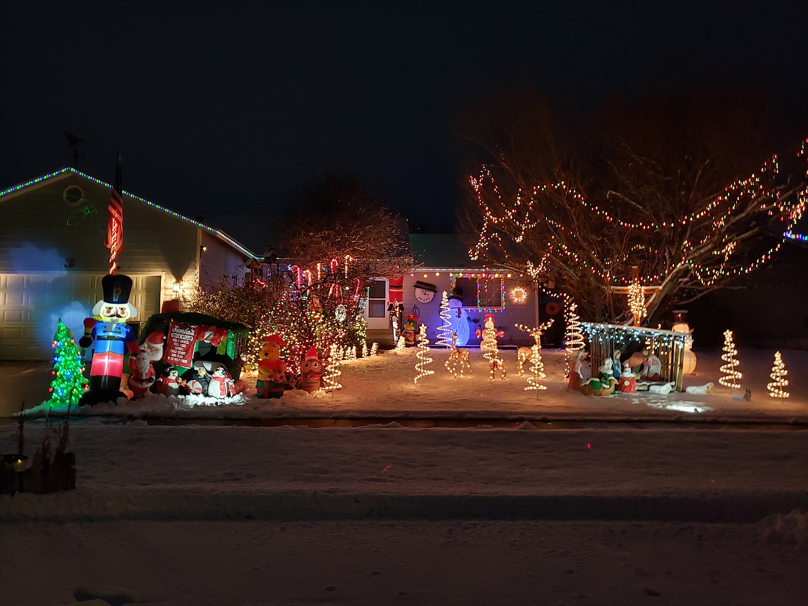 Third place people's choice award winner, the Fishers have been decorating their house for about 20 years. While proud of their 2020 lights, next year they are thinking more lights, blowups and color-coordination. Photo courtesy Rathdrum Parks and Recreation.