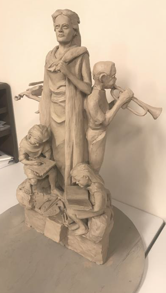 "The Spirit Of Coeur d'Alene" depicts a six-foot-tall woman standing over four children in various stages of learning and artistic expression. (Courtesy city of Coeur d'Alene)