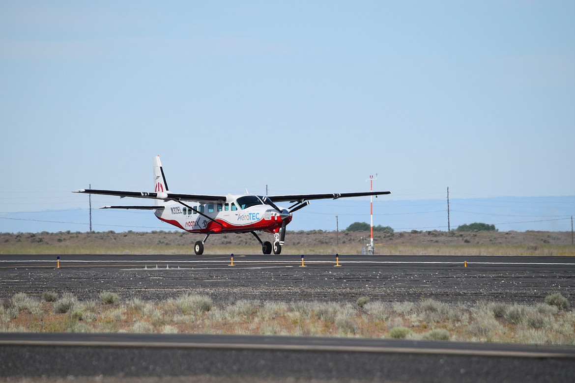A battery-powered Cessna Caravan touches down in Moses Lake after a late May test flight.