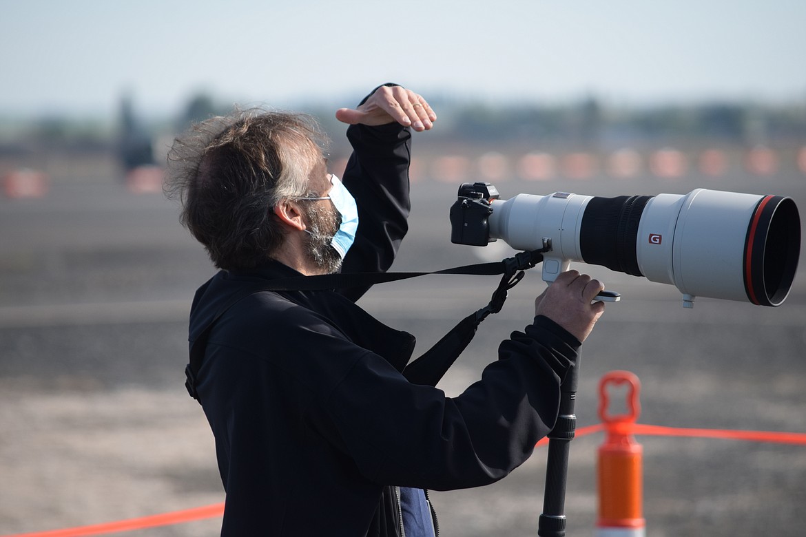 AeroTEC President Lee Human gazes up during the first test flight in May of a battery powered Cessna Caravan.