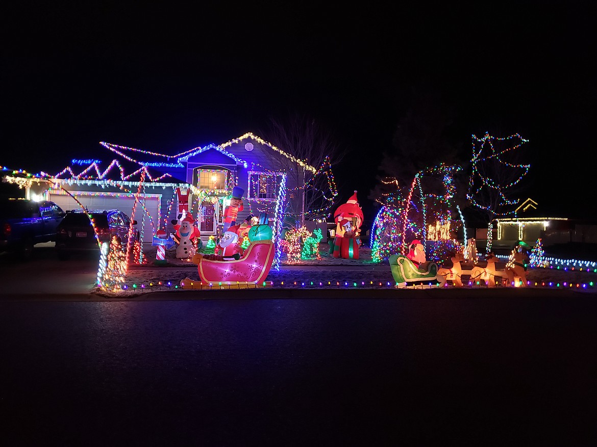 Bigger and better is the name of the game for the Clark W. Griswold prize winner, the Zeilstra family. On their lawn visitors can see two Santas in their sleighs, Olaf from Frozen, and a nutcracker. Photo courtesy Rathdrum Parks and Recreation.