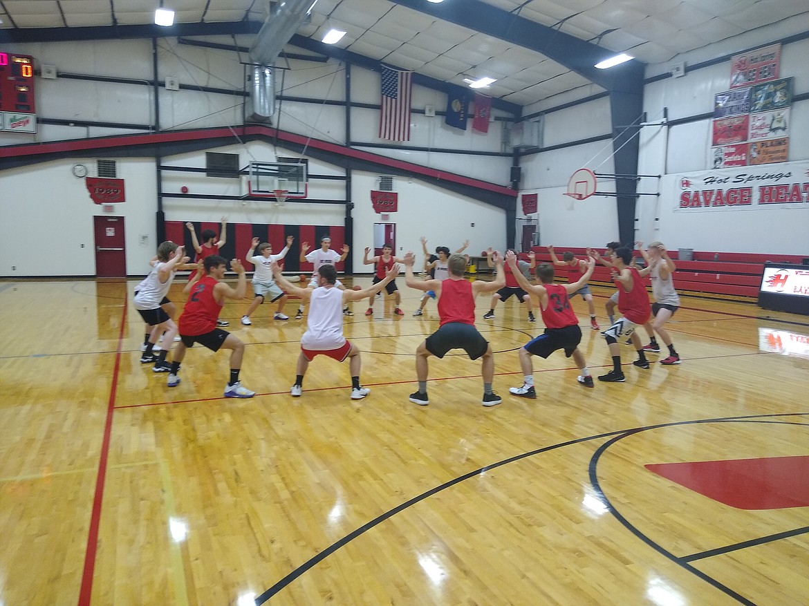 Members of the Hot Springs boys basketball team take part in a recent drill. (Photo courtesy Steve Fredrickson)