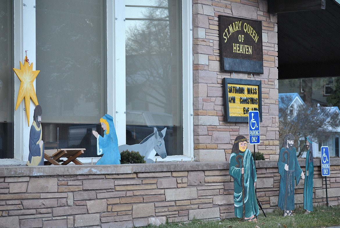 Perhaps the signs should say "Shepherd Parking Only.” The Nativity scene was put on display at Mary Queen of Heaven Catholic Church Dec. 21  by Jack and Sylvia Downing. Lo, as they brought out the wooden figurines from storage they noted that one of the wise men were missing. Nonetheless the real star of the show was baby Jesus' arrival in his trough in the manger. (Amy Quinlivan/Mineral Independent)