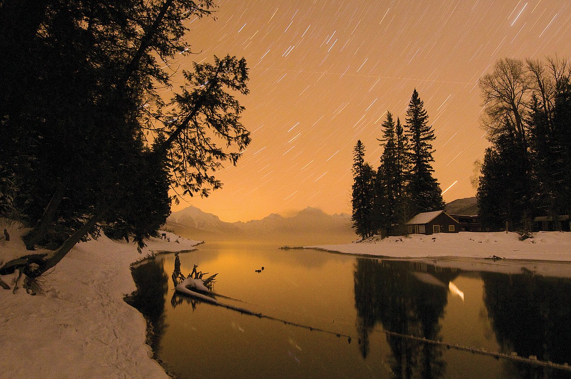 Stars streak the night skies in Glacier National Park in this long exposure file photo. (Chris Peterson photo)