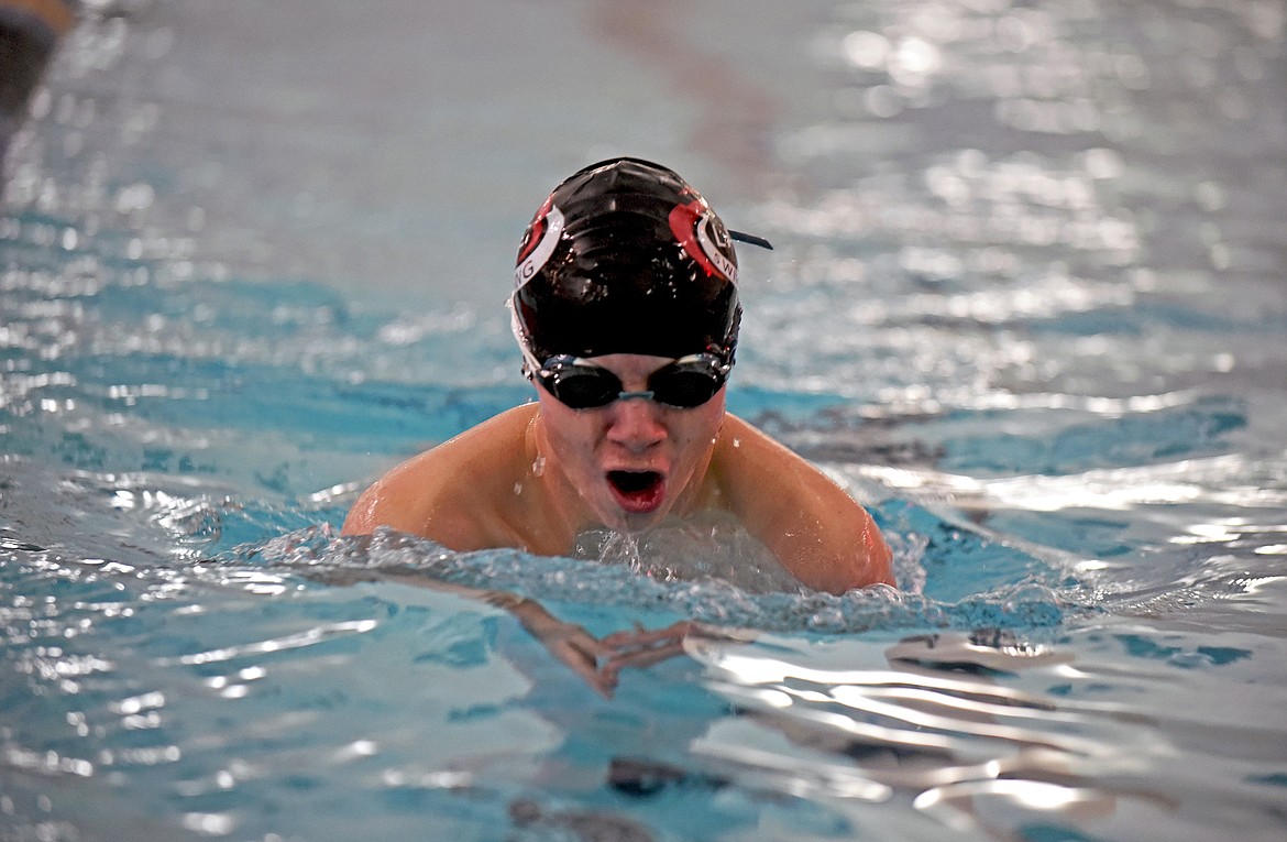 Bulldog returning swimmer Aaron Dicks swims during practice Dec. 10. (Whitney England/Whitefish Pilot)