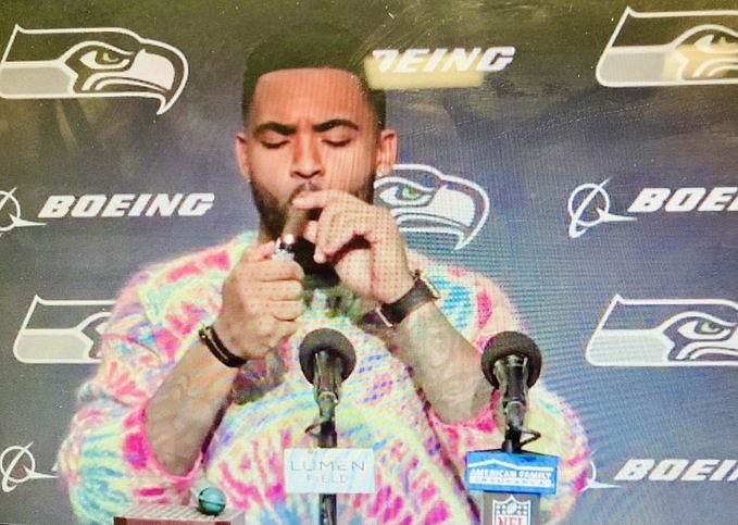 Courtesy of ADAM JUDE
Seattle Seahawks safety Jamal Adams lights a victory cigar at a press conference following Sunday's 20-9 win over the Los Angeles Rams at Lumen Field in Seattle.