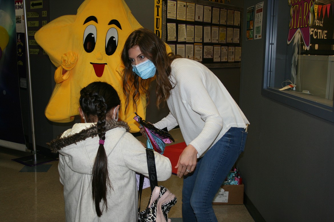 Students got help getting to their classrooms on the first day of in-person instruction at Scootney Springs Elementary in Othello.