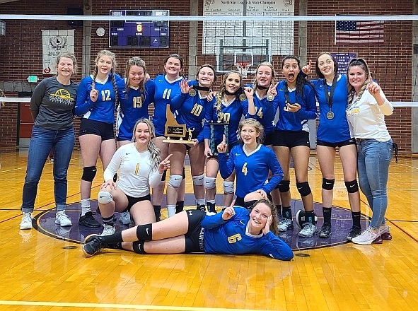 The Clark Fork volleyball team poses for a photo after taking down Mullan in the 1A Division II District 1 championship on Oct. 22.