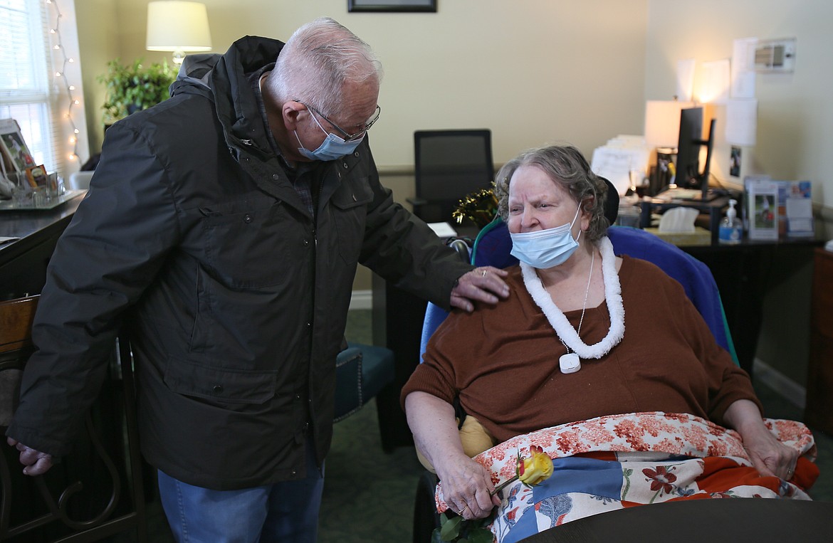 "Hi honey, how are you doing?" Glen Maier asks Nora Maier, his bride of 70 years, as he visits her Thursday afternoon at Honeysuckle Senior Living.