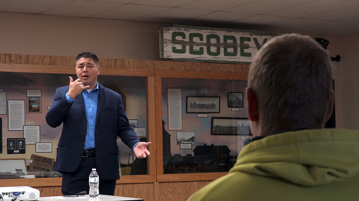 Frederick Lee presents a suicide prevention program called QPR (Question, Persuade, Refer) in Scobey, Montana. Organizations offering youth suicide intervention and prevention initiatives are struggling to sustain the same level of services during the pandemic. (Sara
Reardon/Kaiser Health News)