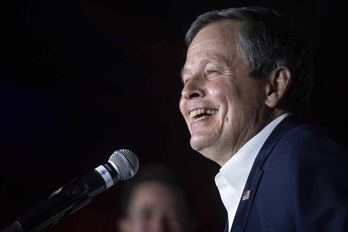 Sen. Steve Daines, R-Mont., addresses his supporters early Wednesday, Nov. 4, 2020 in Bozeman, Mont. Daines has been reelected to the Montana Senate seat he wrested from Democrats six years ago. The former business executive and President Donald Trump loyalist defeated the state’s Democratic governor, Steve Bullock. (AP Photo/Tommy Martino)