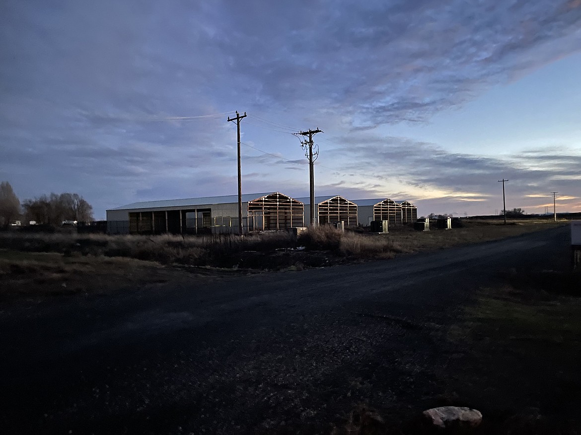A proposed cryptocurrency mining facility sits partially finished near the intersection or Road 1 SE and Road L.4 SE south of Moses Lake. Demand for electricity from cryptocurrency businesses declined during 2020, and that meant the Grant County PUD removed the business from its "evolving industries" class.
