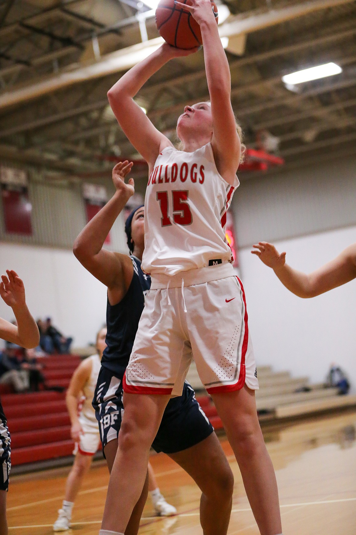 Sophomore Karlie Banks grabs a rebound on Tuesday night at Les Rogers Court.