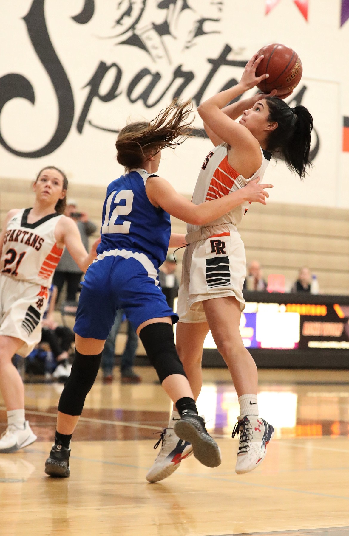 Sophomore Lilly Freitas pulls up for a shot during Monday's game against North Idaho Christian.