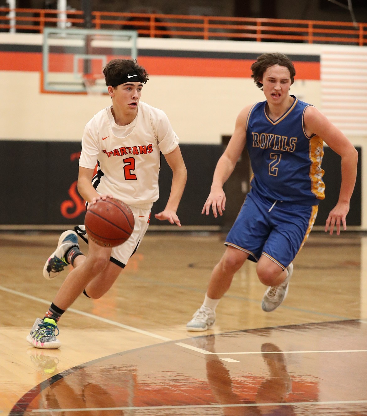 Sophomore Luke Butler drives toward the basket on Monday.