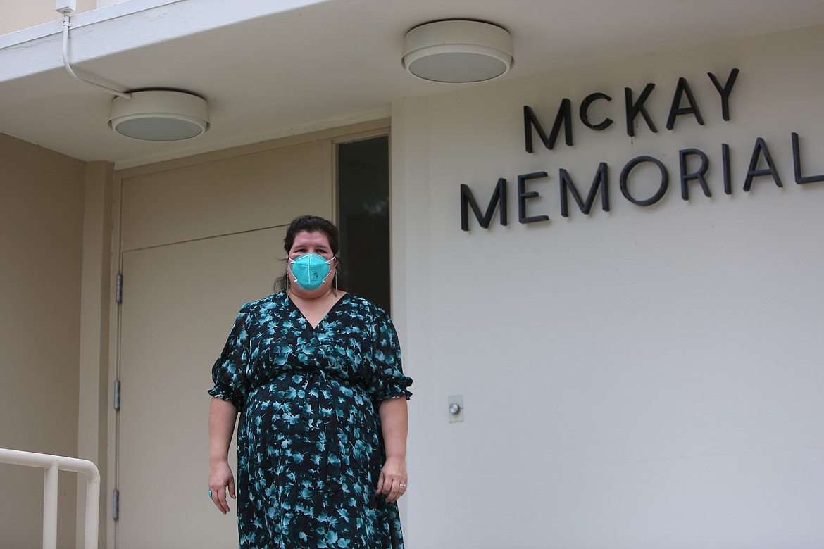 McKay Healthcare and Rehabilitation Center Administrator Erica Gaertner stands outside the facility she oversees. McKay was hard hit by COVID-19 in November, and saw 32 of the facility's patients transferred to a COVID-specific long-term care center in Pasco.