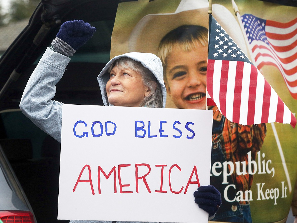 Susan Price Lake reacts during Tuesday's rally in Coeur d'Alene to support President Donald Trump.