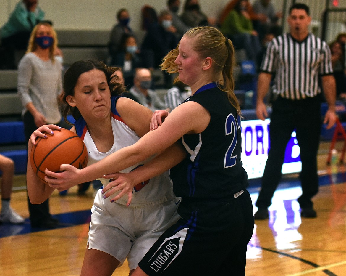 Arianna Saari looks to drive against a Stillwater defender Saturday.
Jeremy Weber