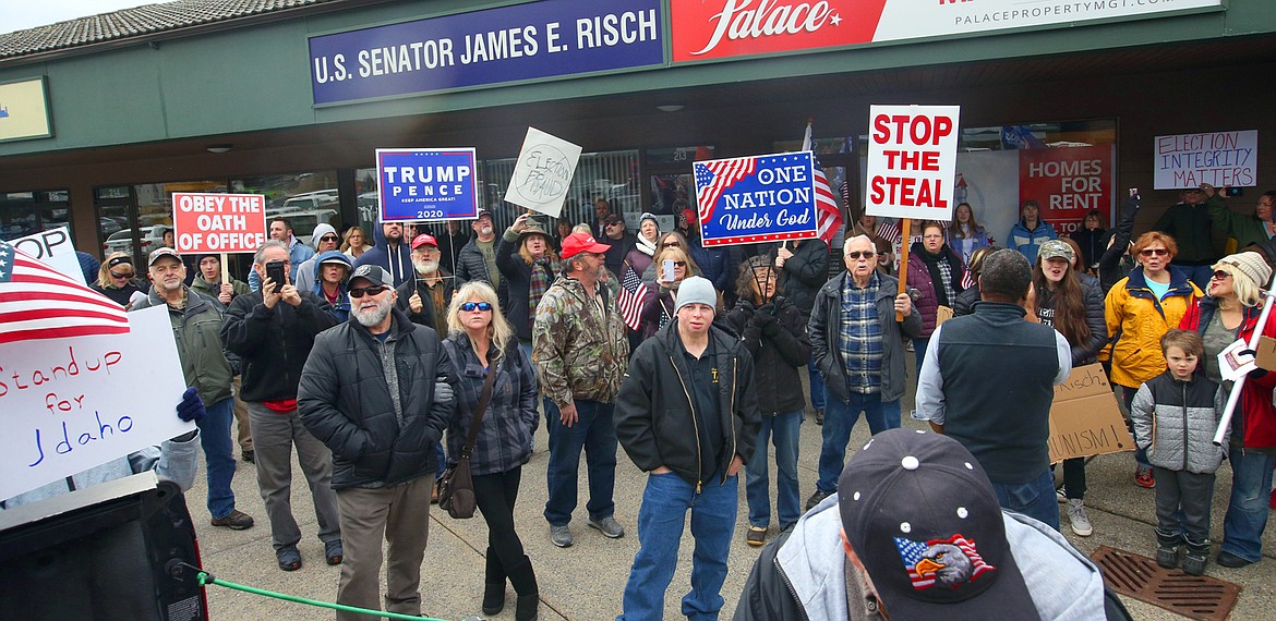 A crowd listens to guest speaker Matt Shea at Tuesday's rally in Coeur d'Alene for President Donald Trump.