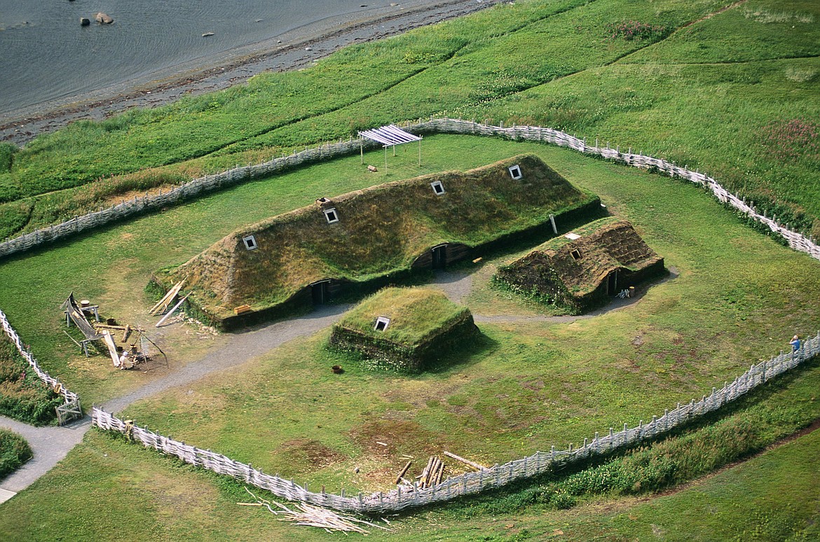 Reconstruction of Viking longhouse and smaller buildings at L’Anse aux Meadows in Newfoundland, site of the first European settlement in North America nearly 500 years before Columbus.