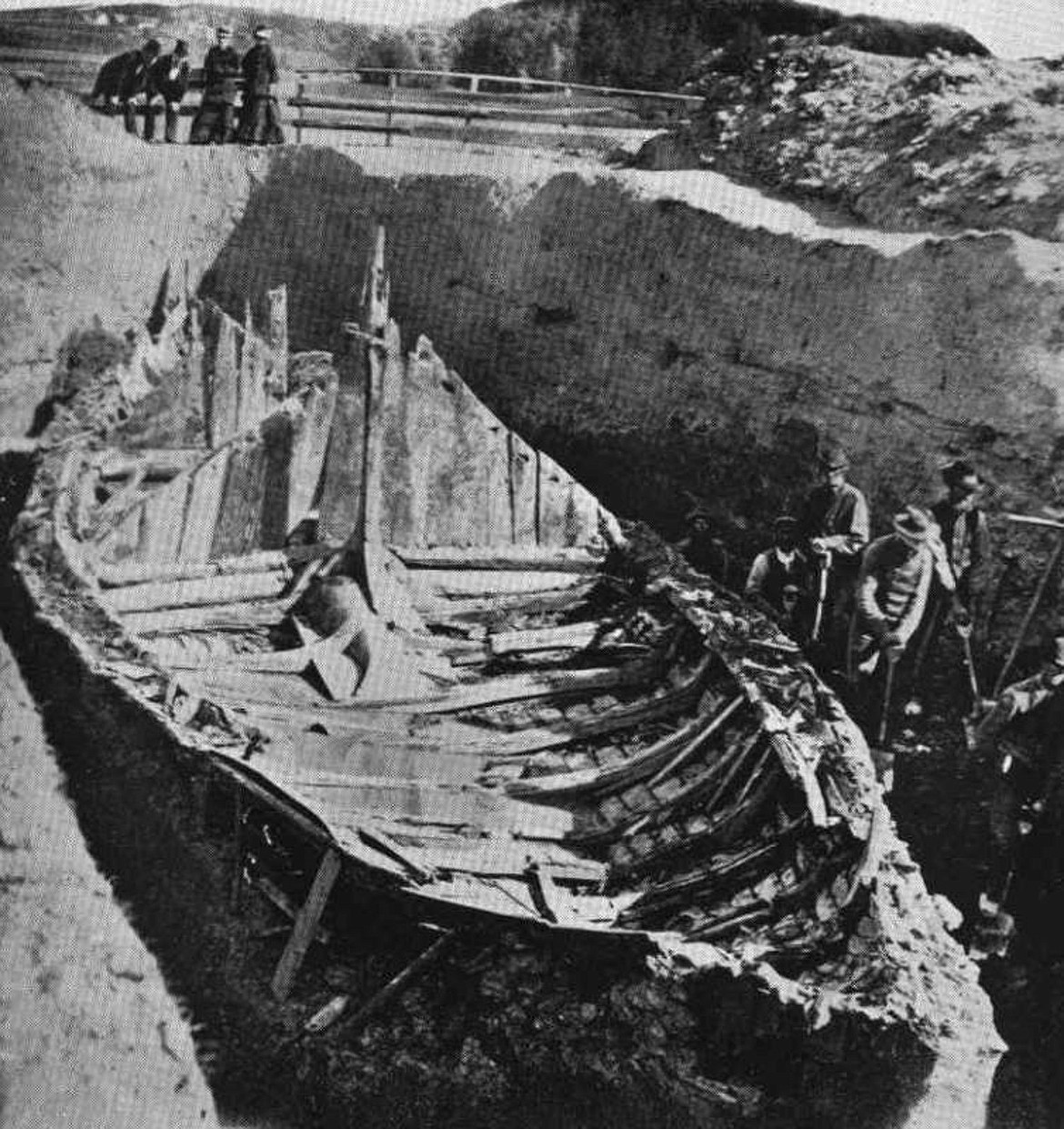 The 78-foot long Gokstad Viking ship was discovered buried on a farm near Oslo in 1880, apparently a funerary ship, with remains of a middle-aged man in the hull, surrounded by remains of two peacocks, two goshawks, eight dogs and 12 horses (photo c.1880).