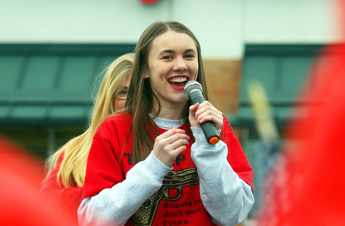 Ashlyn Murray talks to the crowd before singing the national anthem at Wednesday's pro-Trump rally in Coeur d'Alene.