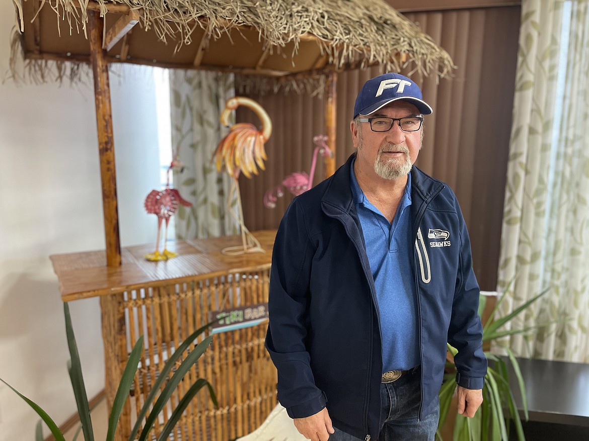 Hector Garza, founder and owner of Flamingo Trucking, at the little "Tiki Bar" in the company's lobby.