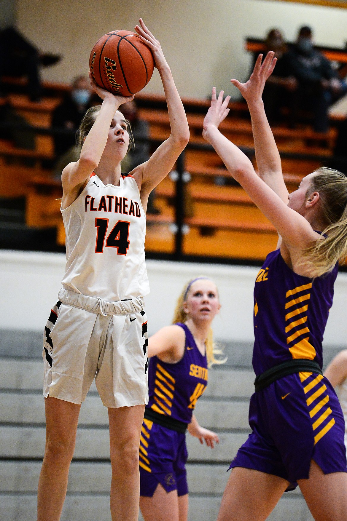 Flathead's Kennedy Moore (14) looks to shoot in the first half against Missoula Sentinel at Flathead High School on Thursday. (Casey Kreider/Daily Inter Lake)