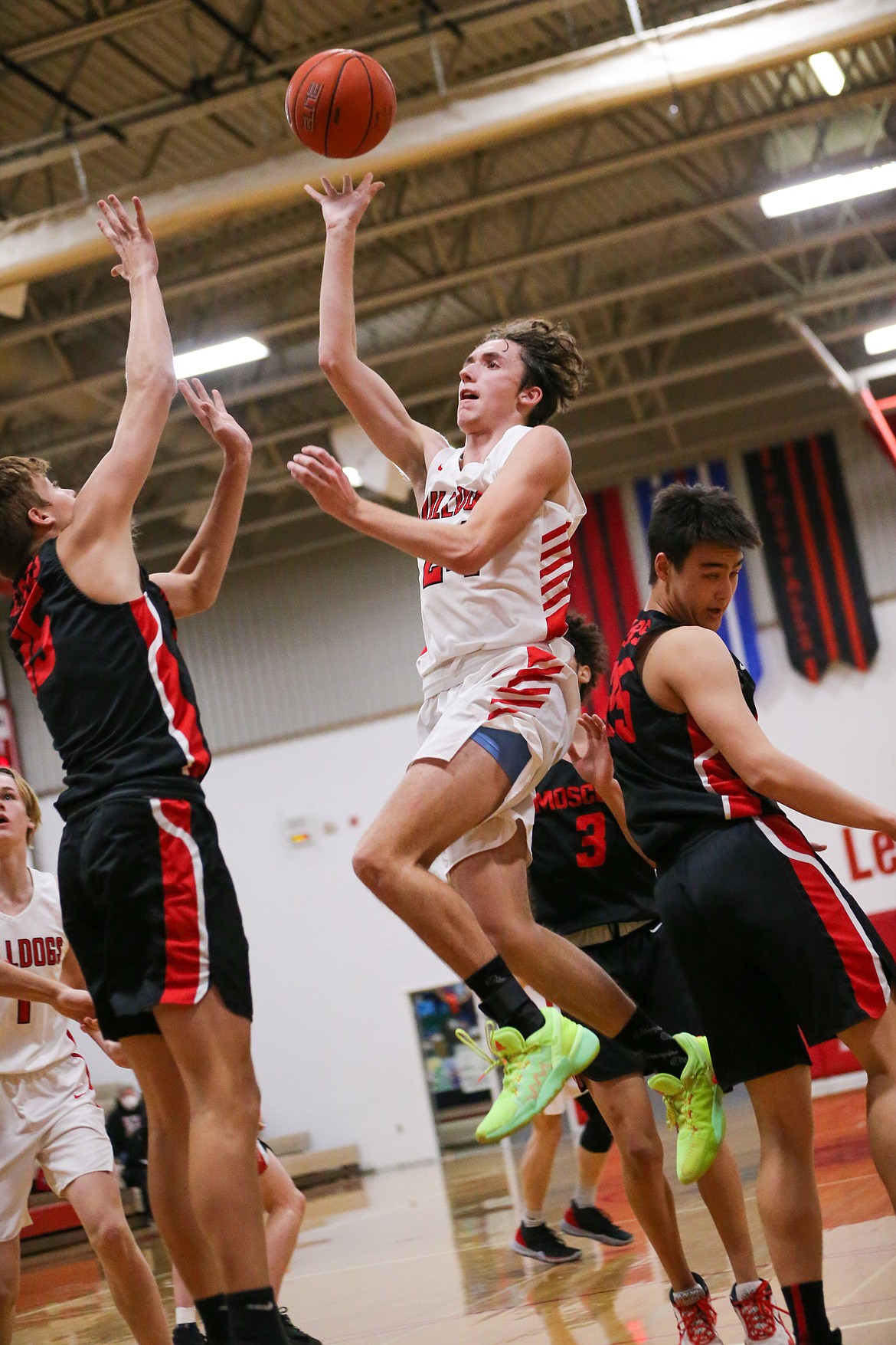 Sophomore Randy Lane drives to the basket and attempts a layup during the second half of Friday's game.