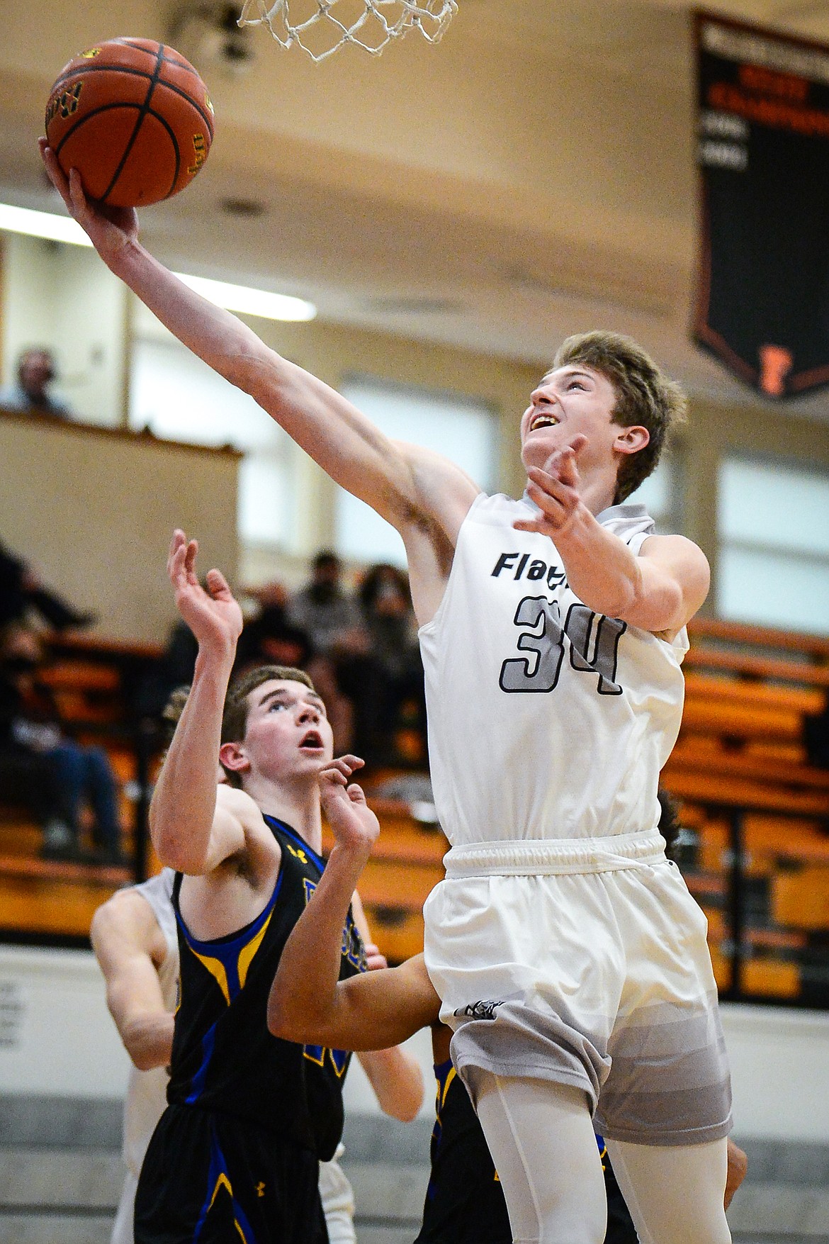 Flathead's Joston Cripe (34) heads to the hoop in the first half against Missoula Big Sky at Flathead High School on Saturday. (Casey Kreider/Daily Inter Lake)