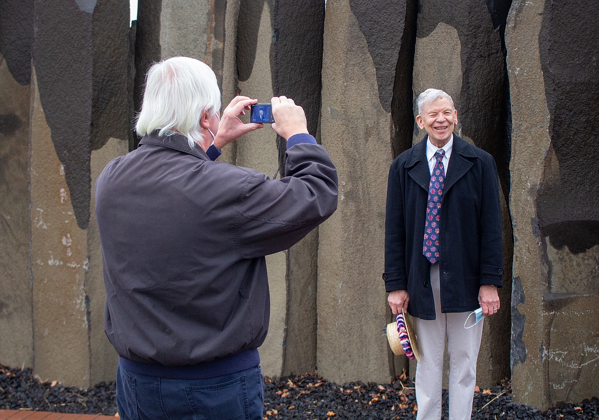 Steve Starr (left), chair of the Grant County Democrats for 2021, snaps a picture of secretary Louis Logan. Democrats have announced the officers and initiatives for 2021.
