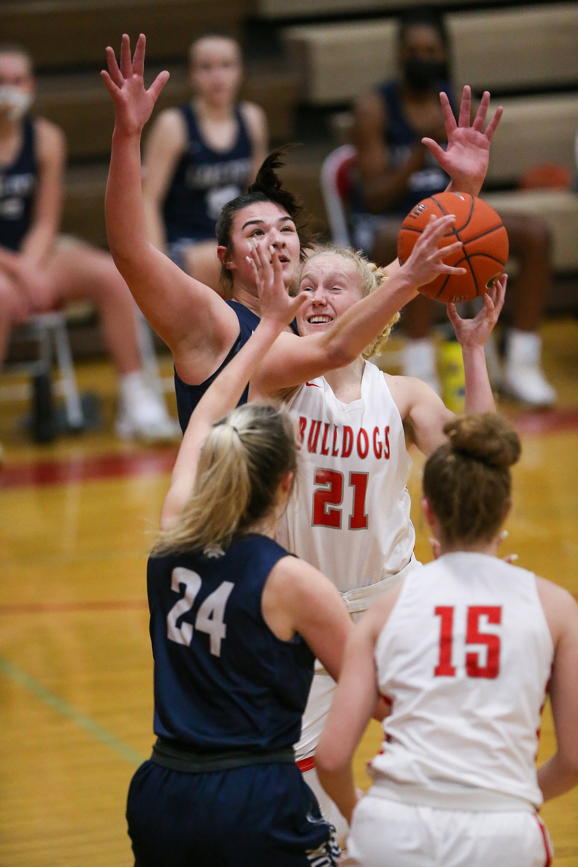 Hattie Larson battles Lake City's Brooklyn Rewers for a rebound on Tuesday.