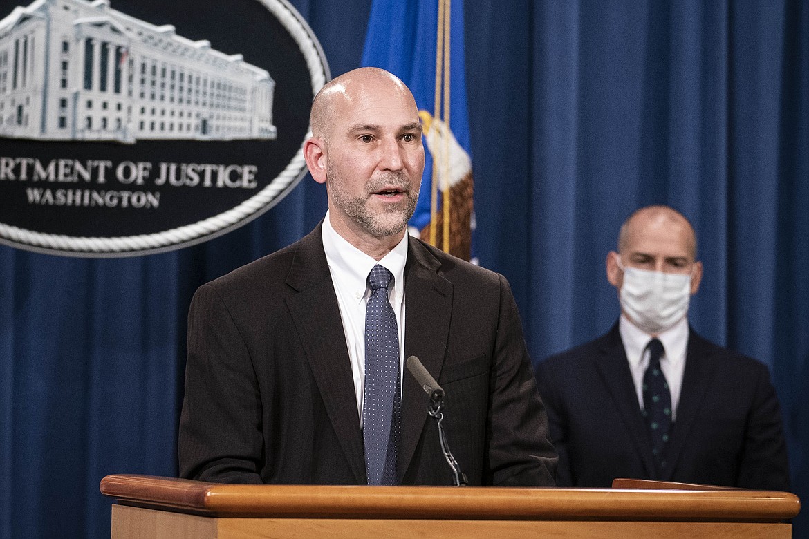 Steven D'Antuono, head of the Federal Bureau of Investigation (FBI) Washington field office, speaks as acting U.S. Attorney Michael Sherwin, right, listens during a news conference Tuesday, Jan. 12, 2021, in Washington. Federal prosecutors are looking at bringing “significant” cases involving possible sedition and conspiracy charges in last week’s riot at the U.S. Capitol.