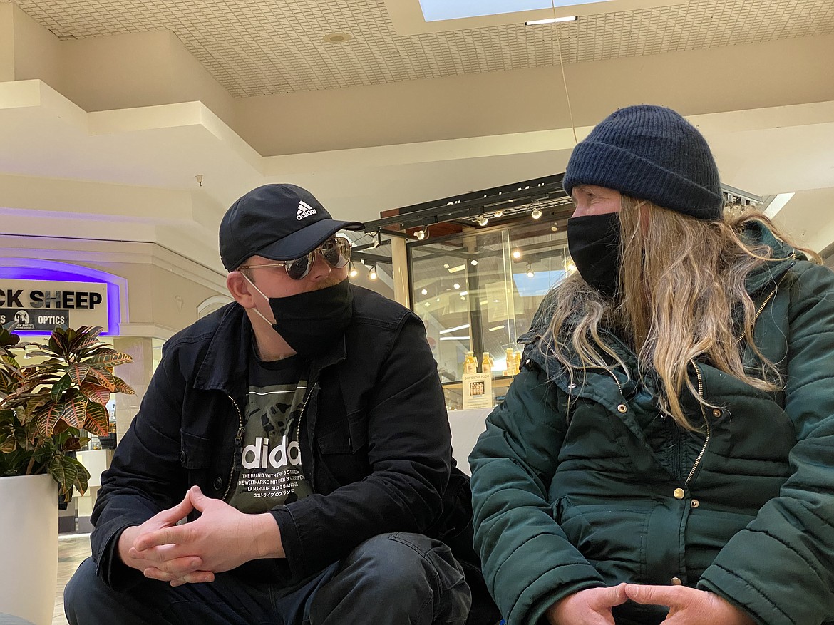 Shane and Anne Bunting both wore masks on Tuesday as they took a break in the Silver Lake Mall to discuss their support of Sheriff Bob Norris' anti-enforcement statement on health mandates. (MADISON HARDY/Press)