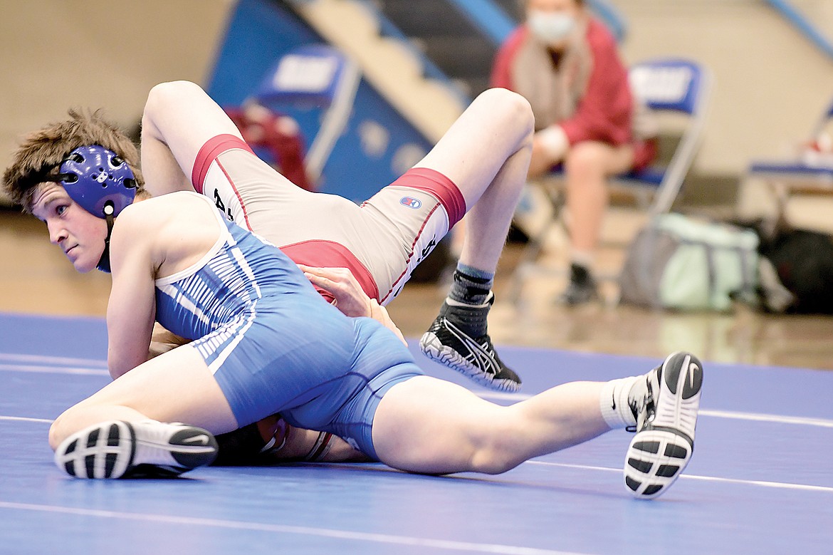 Orion Barta pins Hamilton's Logan Bratsch of Hamilton Tuesday evening. (Teresa Byrd/Hungry Horse News)