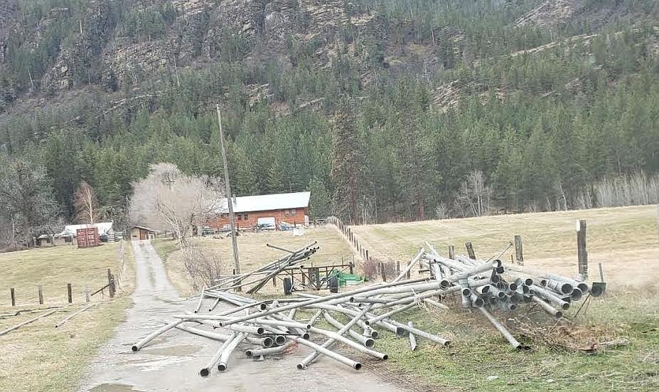 Strong winds knocked out power, cell and internet service as well as damaging vehicles and property Wednesday morning in Sanders County. It also scattered irrigation pipe from its stack at a local farm in the Paradise area. (Photo courtesy Lee Ann Overman)