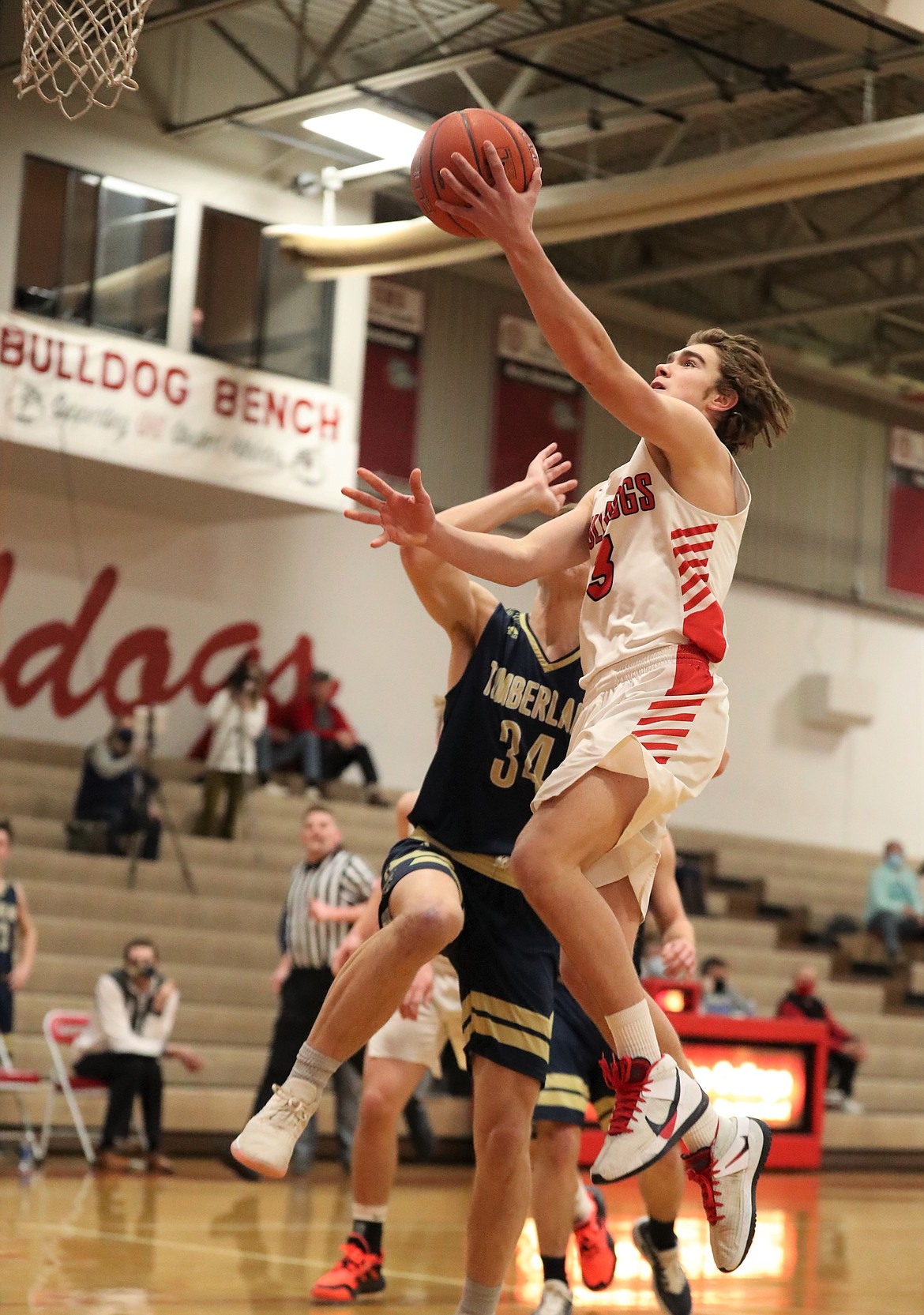 Freshman Max Frank attacks the basket and converts a layup during Thursday's game.
