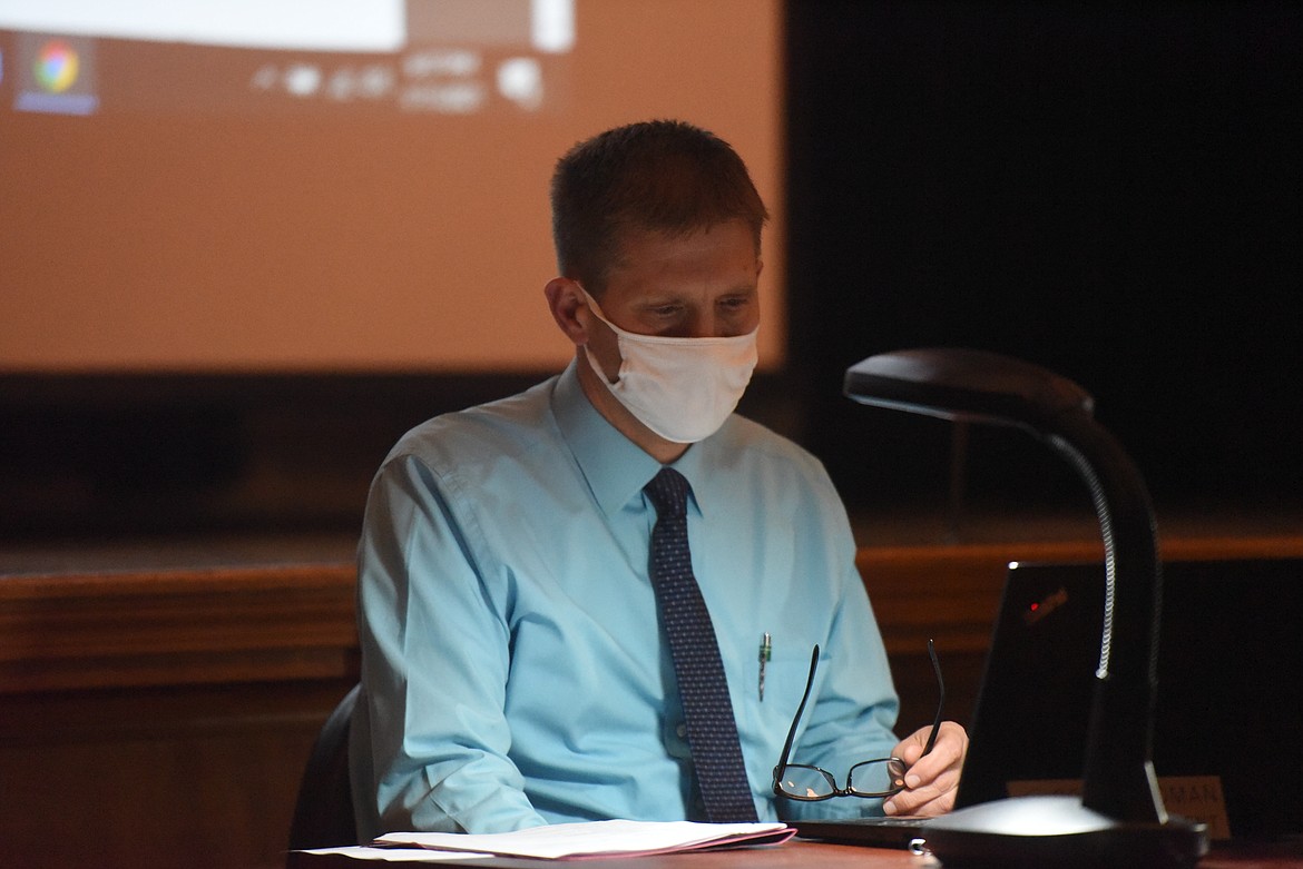 Superintendent Ron Goodman reviews policy during a Jan. 11 school board meeting. (Will Langhorne/The Western News)