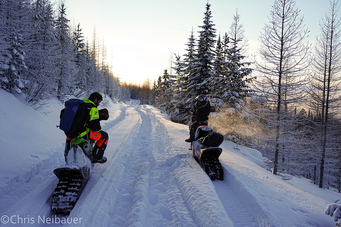 Kyle Allred makes tracks on a snow bike.