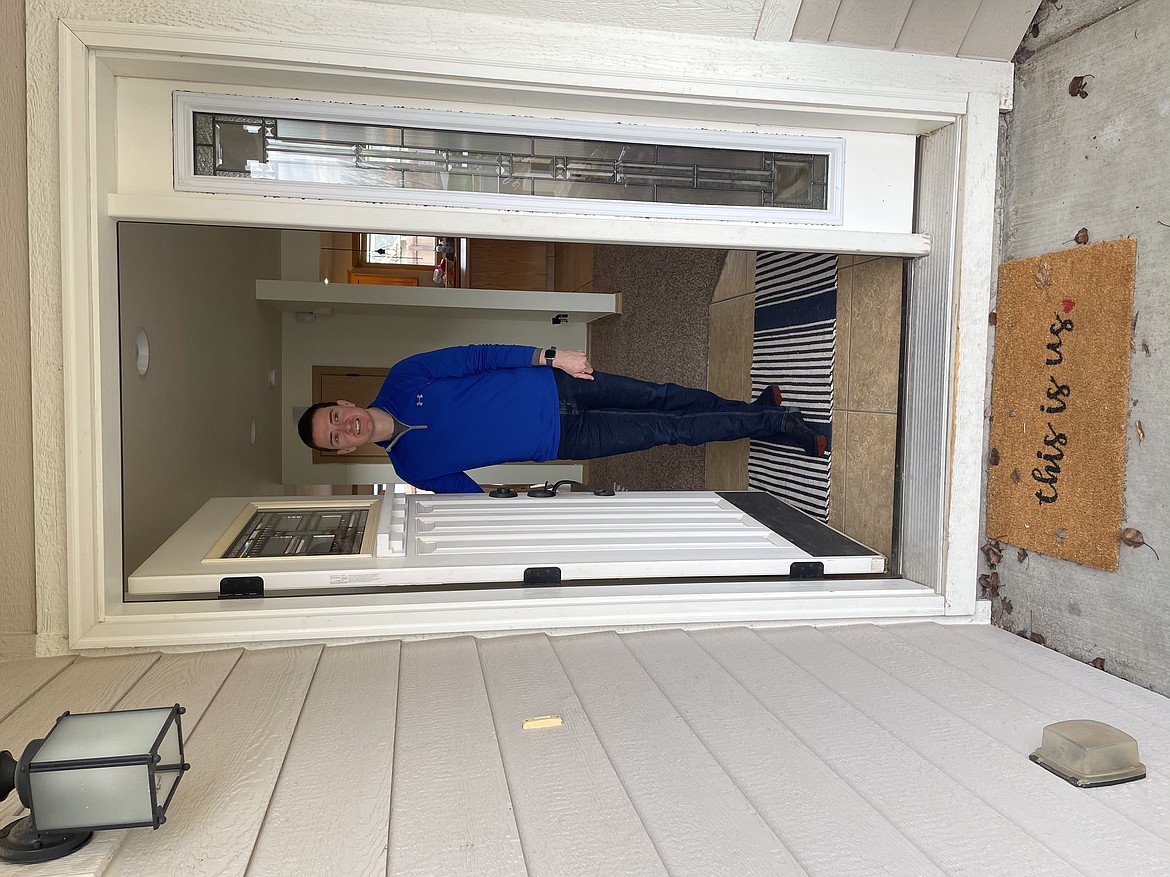 Joel Graves at the entrance to his family's Moses Lake home. The Graveses relocated to Moses Lake last September after Joel's employer, Microsoft, sent many of its engineers and client support people home for work following the COVID-19 outbreak.