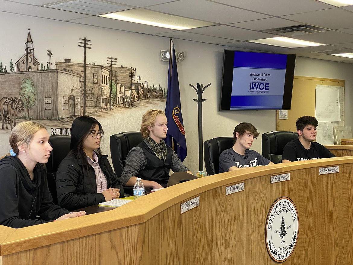 In a mock planning and zoning commission activity, 10 Mountain View High School seniors got a taste of local government operations Thursday afternoon at Rathdrum City Hall. From left: Ashton Owens, Stephanie Silva, Hunter Hilbert, Conner Fleweling and Dakota Gauthier. (MADISON HARDY/Press)