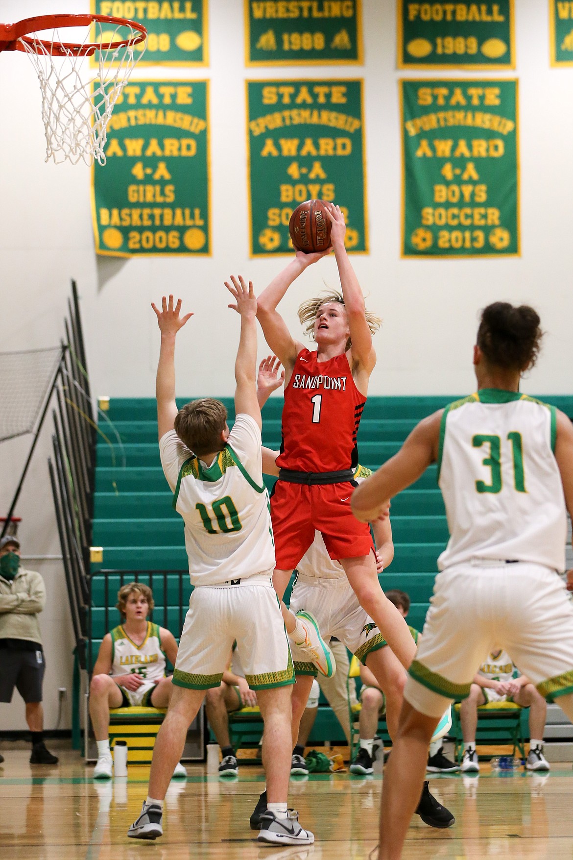 Colin Roos rises up for a shot over the Lakeland defense.