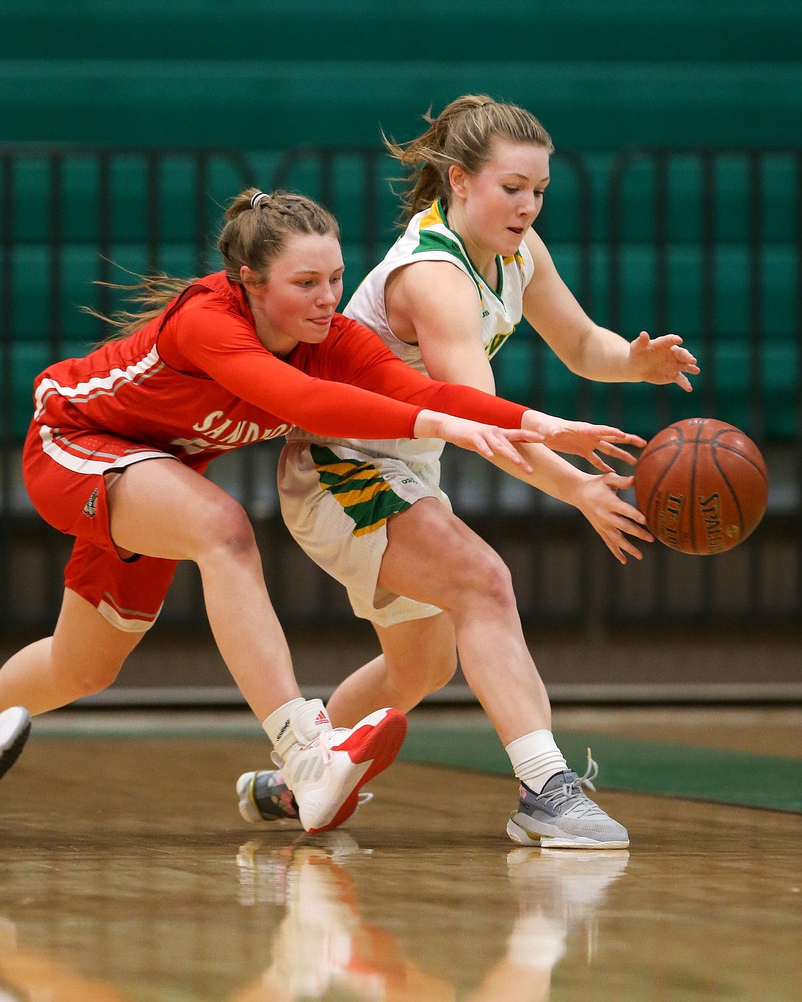 Kaylee Banks attempts to steal the ball from a Lakeland player on Friday.